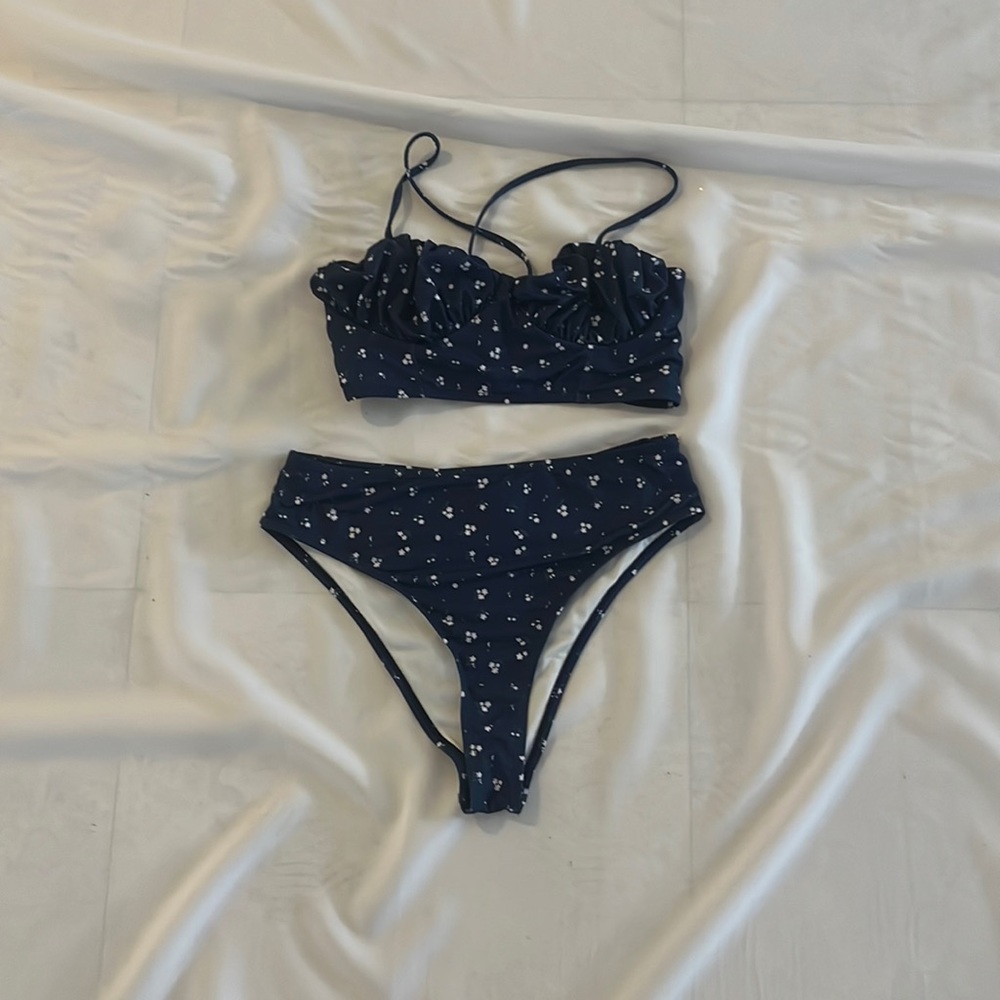 Blue swimsuit with pink flowers